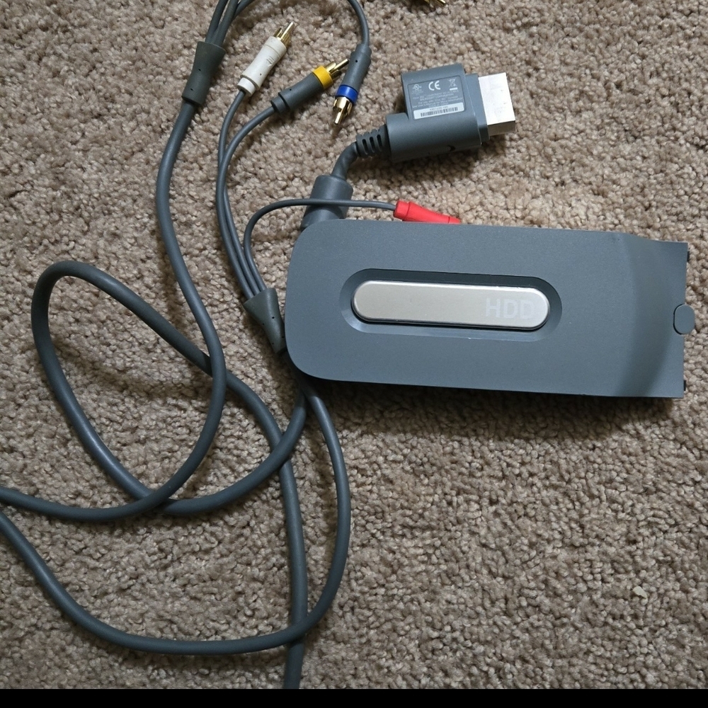 Av cables and 4gb hard drive for xbox 360, tested working.